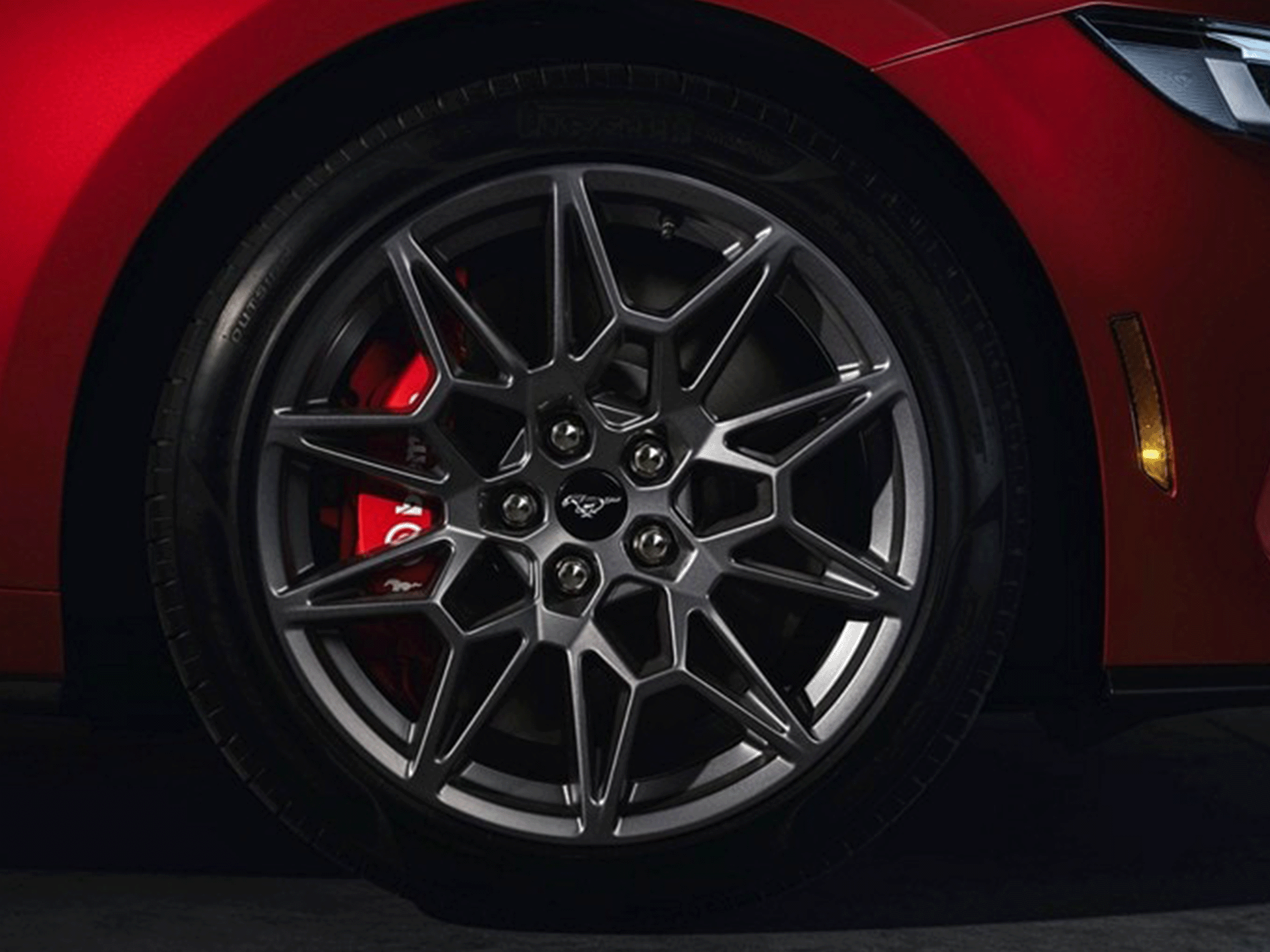 Mustang wheel with red Brembo brake caliper